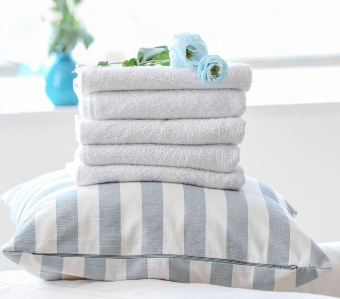 Stack of clean soft towels on pillow Stack of clean soft towels on pillow